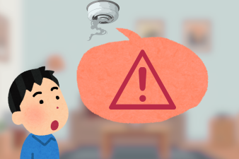 Piirroskuvassa henkilö ihmettelee palovaroittimesta tulevaa kovaa ääntä