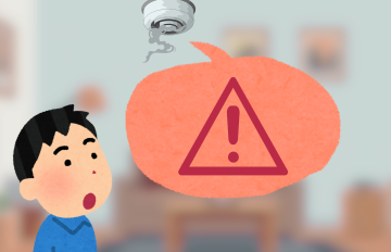 Piirroskuvassa henkilö ihmettelee palovaroittimesta tulevaa kovaa ääntä