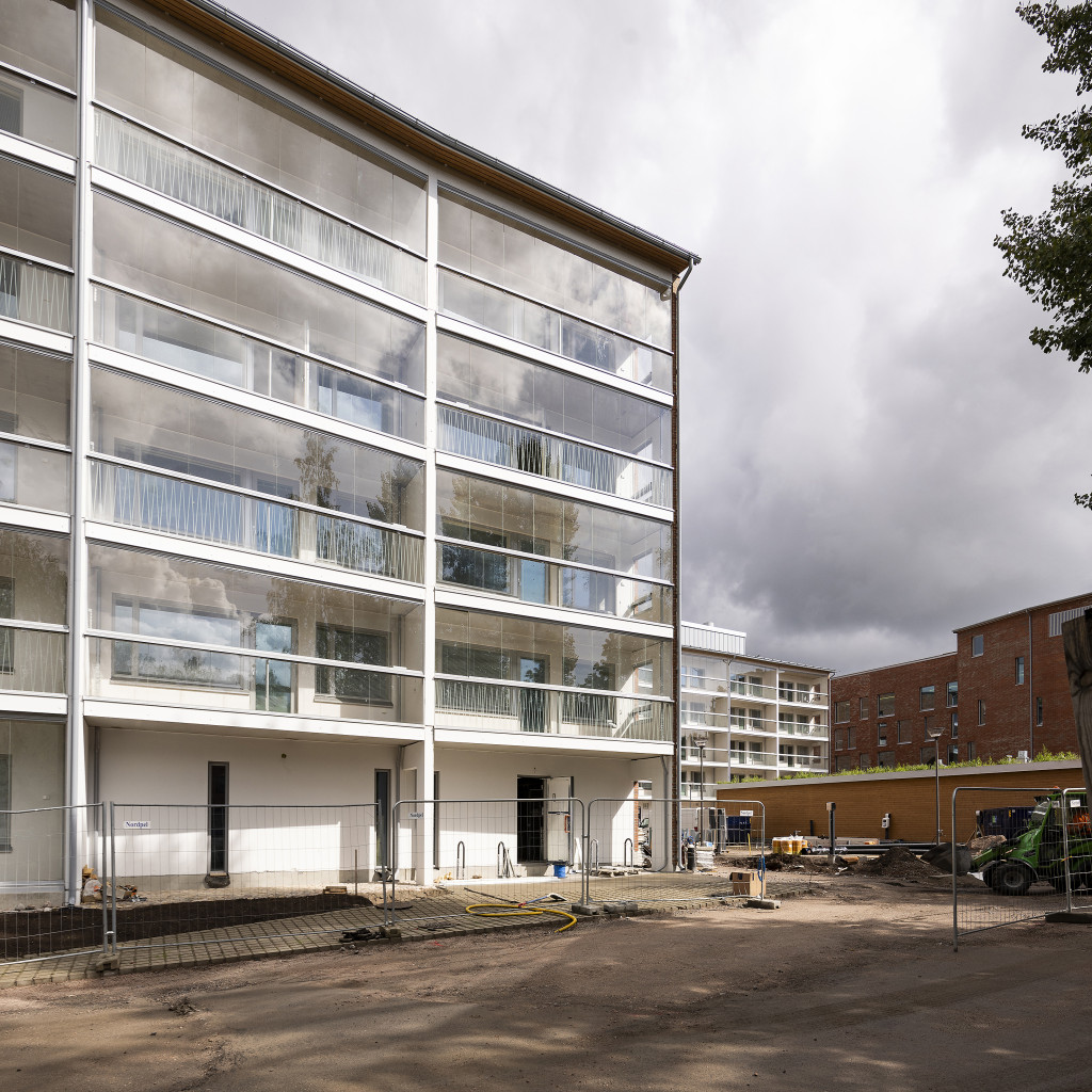 A new block of houses with glazed balconies.